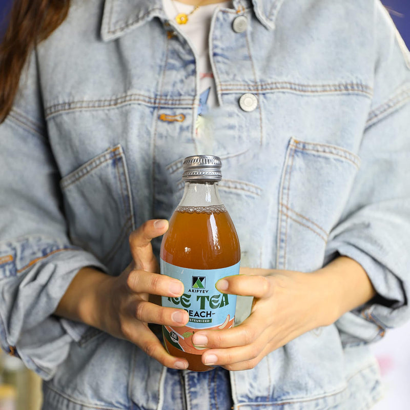 Load image into Gallery viewer, AKIFYEV BIO Ice Tea Peach 12 x 330 ml | Premium Organic Ice Tea in Glass Bottles | Cold Brew + Nitrogen Flush | Natural, Vegan &amp; Allergen-Free Refreshment
